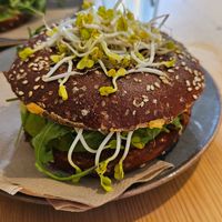 Belegter Laugenbagel aus der Vitrine at Mana Food - Moabit in Berlin