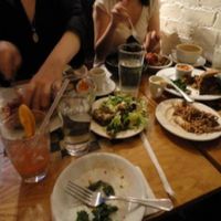 Happy vegans feasting :-) at Sacred Chow in New York City