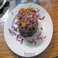 Orange Blackstrap B B Q Seitan (say-tahn) w/spicy onions at Sacred Chow in New York City