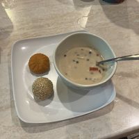 dessert options- sesame puff, pumpkin spice puff, and coconut milk boba. Delicious!  at Trendy Vegan in Houston