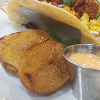 Seasoned Harvest Potatoes with Vegan Spicy Aioli at Harvest Kitchen & Bakery in Katy
