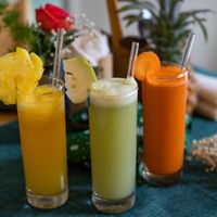 Fruit juices. Which color do u choose? at Earth Cafe in Dong Hoi