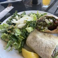 Falafel wrap with side caesar salad   at Otherlands Beer in Bellingham