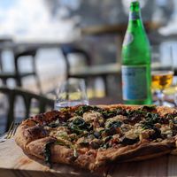 Grilled eggplant, zucchini, capsicum, spinach, tomato, artichoke,
mushrooms, olives, garlic, chilli and fior di latte (VO) at 8 at Trinity in Morisset Park