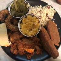 Shrimp, rib tips, tenders, rice, greens, Mac, roll at Karelyns Vegan Soul Café in Orlando