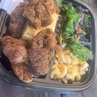Fried chicken ( oyster mushroom), Mac and cheese, kale salad and cornbread   at Karelyns Vegan Soul Café in Orlando