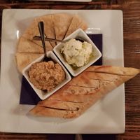 Vegan hummus and baguette. Cheese spread and pita not Vegan. at The Grape Tap in Wasilla