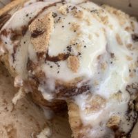tiramisu cinnamon roll (half eaten)   at Cinnaholic in Wilmington