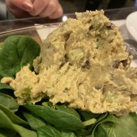 Half eaten Vegan chicken salad on spinach (served with Club crackers)   at The Coffee Factory in Muskegon