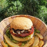 Beetroot burger with caramelized onions at Omampitú in Florianopolis