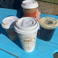 Dirty chai (added espresso) with oat and almond milk, nitro cold brew, and regular chai at RND Coffee Lounge in Roanoke