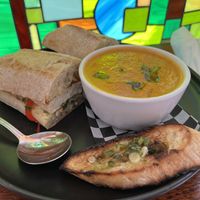 Tofu banh mi with tomato/sweet potato/coconut soup  at Buena Onda Cafe in St Augustine