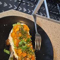 Almond Ricotta, Avocado,  butternut squash Toast with pumpkin seeds 😋 at Buena Onda Cafe in St Augustine