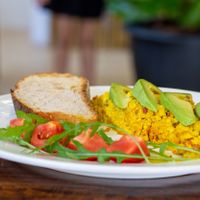 Tofu scramble with avocado and Slice of on Sourdough Bread. at Nang Sabai Cafe Artisan Bakery in Koh Samui