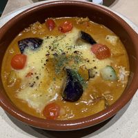 Curry rice with vegan cheese  at Vegan Bistro Jangara in Tokyo