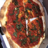 Vegan 12 inch pie with basil   at Pino's Pizza in Deer Park