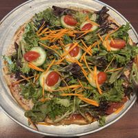 Salad pizza with vegan cheese and sauce  at Colony Grill in Milford