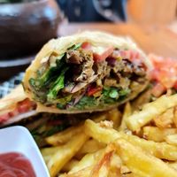 Seitan gyro with garlic fries. at Soul Veg(etária)  in Nairobi