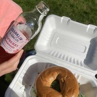 Smoked Tofu & Avocado Bagel w/ ethically sourced raspberry lemonade. at Copper and Moss in Shipley