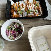 Burani, served with bread and a side salad at Spice Bridge - Food Hall in Tukwila
