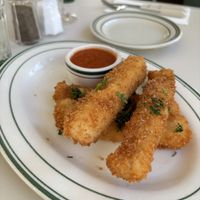 These were the worst mozzarella sticks I’ve ever had. Crumbled, no flavour, no stretch.   at Stefano's Diner in Toronto