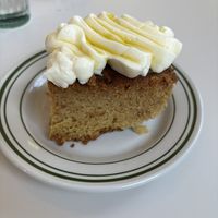 Olive oil cake with a very sweet buttercream. Would have been great with some citrus. As it was it only had a sweet flavour and wasn’t exciting.   at Stefano's Diner in Toronto