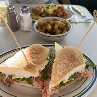 Italian sub, fried potatoes, benny in the back  at Stefano's Diner in Toronto