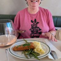 Happy patron with New/School Foods plant-based salmon at Stefano's Diner in Toronto