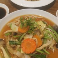 Mixed noodle and veg. Back dish mushrooms, tofu and peanuts with rice paper at San May in Phu Quoc