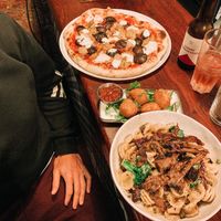 Cheese crochettes, pollo pizza and the orecchiette pasta with added pulled brisket (A recommended dish from the staff). at Nolita in Wellington