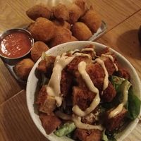 Ceasar salad with added seitan chicken: definitely add chicken, it was the best part of the dish but overall a great salad although a little overpriced + gnocco fritto: basically f at Nolita in Wellington