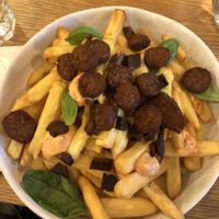 Pizza loaded fries  at Nolita in Wellington