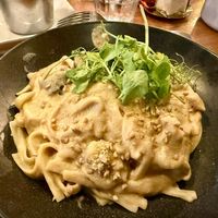 Alfredo pasta with shredded vegan chicken  at Nolita in Wellington