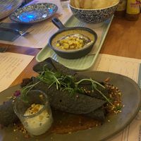 taquitos and cheezy sauce with chips  at Margo's in Queenstown