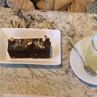 Vegan gluten free hazelnut and chocolate cake with pineapple tea at Hoy Te Quiero in Montevideo
