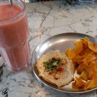 Roasted pumpkin with hummus and a tropical-berry smoothie at Hoy Te Quiero in Montevideo