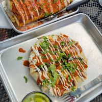 Nocturnal Heartburn burrito and spicy mango crunchy wrap with a side of guac at Terror Tacos in St Louis