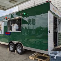 Tucked behind the Tinnin food mart it can be easy to miss when surveying the trailers at the Buzz Mill. at Lo Pans Kitchen by Plow Burger in Austin
