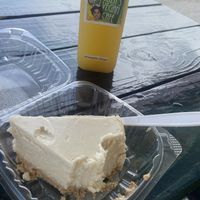 Vegan cheesecake and pineapple ginger juice at Eliza's Vegan Café in Florence