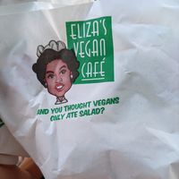Love their logo at Eliza's Vegan Café in Florence