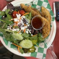 Greek salad with dumplings   at Eliza's Vegan Café in Florence