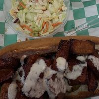 Rib sandwich and coleslaw   at Eliza's Vegan Café in Florence