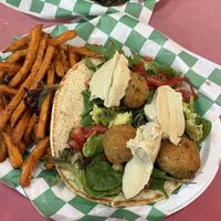 Chickpea and Hummus Wrap with side of Sweet Potato Fries    at Eliza's Vegan Café in Florence