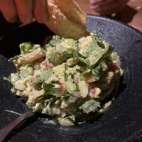 Table side guac! Amazing!   at Iron Cactus in San Antonio