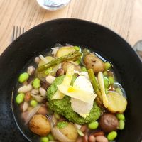 Green and white asparagus, Dutch beans, almond cream, asparagus bouillon, young potatoes, foraged pesto at Kasvio in Utrecht