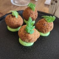 Rye balls stuffed with potato and fermented tofu at Kasvio in Utrecht