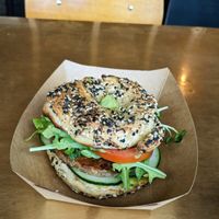 The vegetarian farmstead bagel sandwich with impossible sausage added on 🤌 at Woodgrain Bagel & Deli in Denver