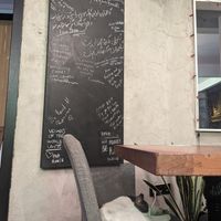 Cute cat and customer board at The Vegan Regime in Istanbul