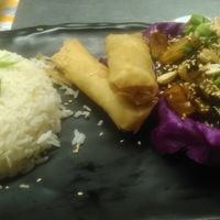 Eggplant with rice and peanuts, and vegetable spring rolls at Granita Cairo in Cairo