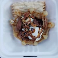Vegan cheese and waffle bowl with dried fruit, pecans, and a balsamic drizzle.  at The Oregon Cheese Cave in Phoenix